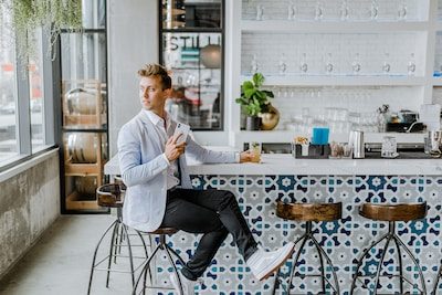 man sitting in chair
